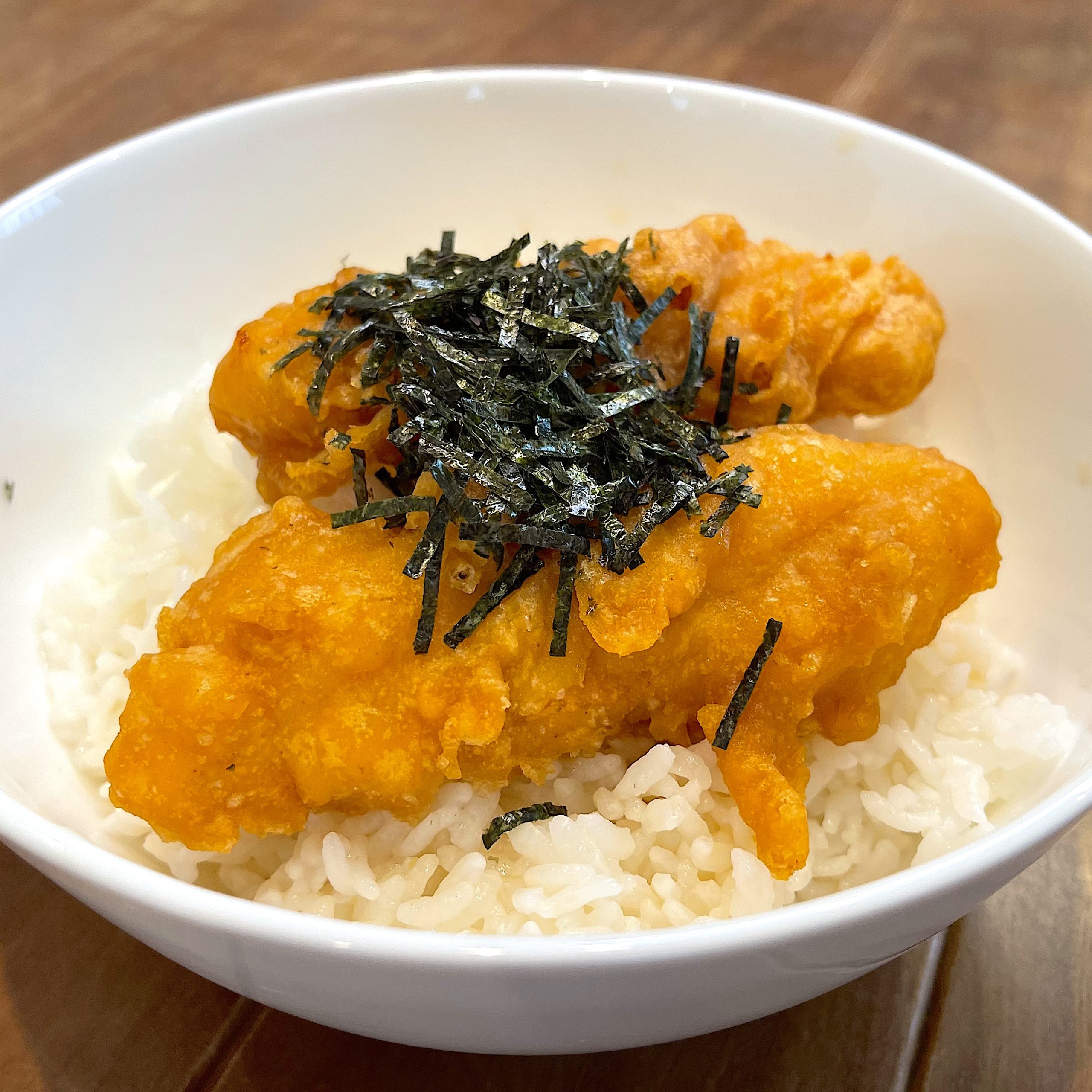 刻みのりをトッピングする完成工程